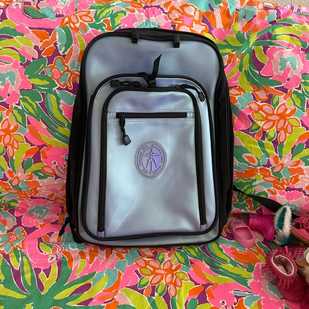 American girl carrier, Gray and Black Backpack with Purple Logo